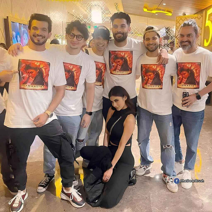 Group of people wearing WYO 'Dharmasthala' t-shirts posing for a photo.