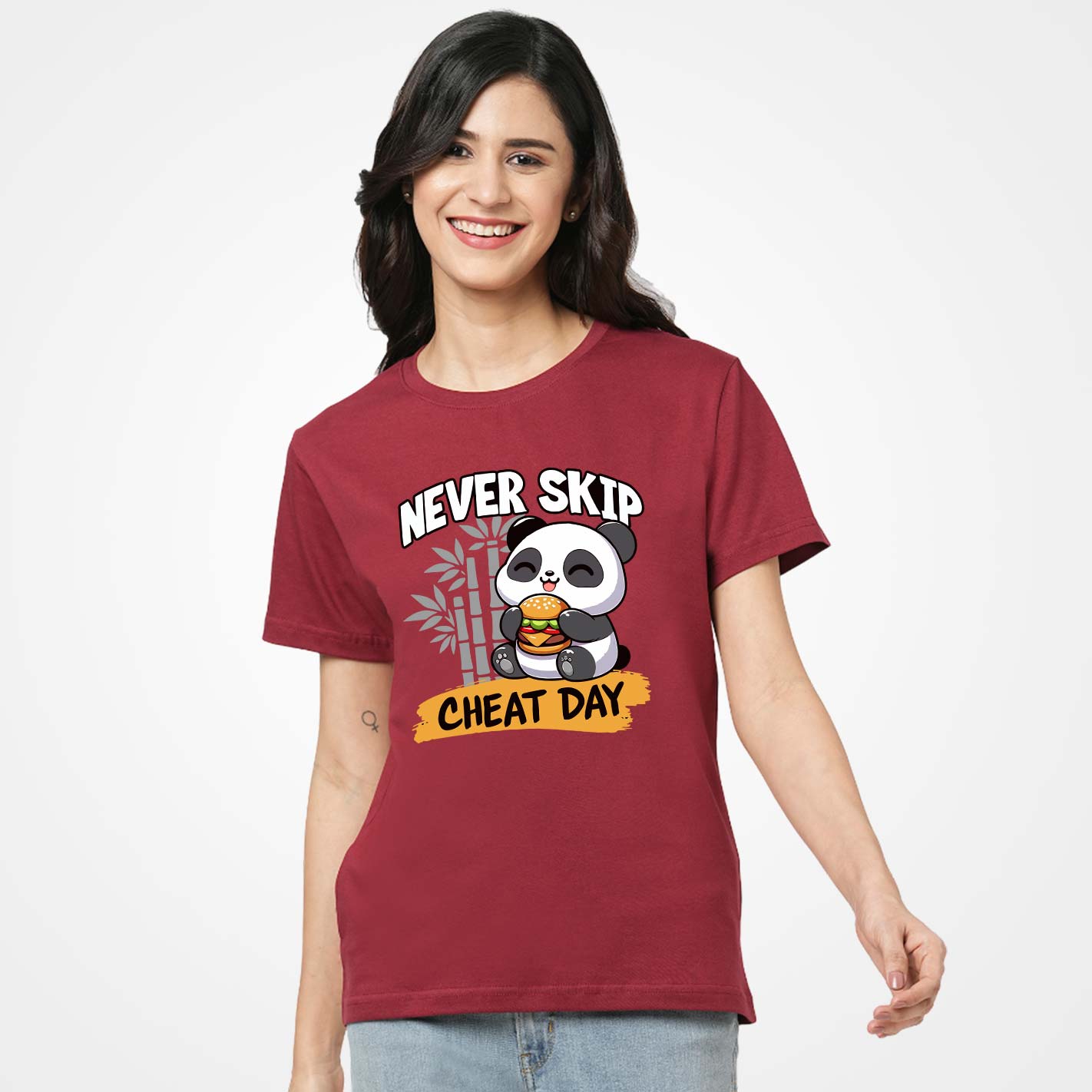 Woman wearing a WYO maroon t-shirt with a panda graphic and text on a white background