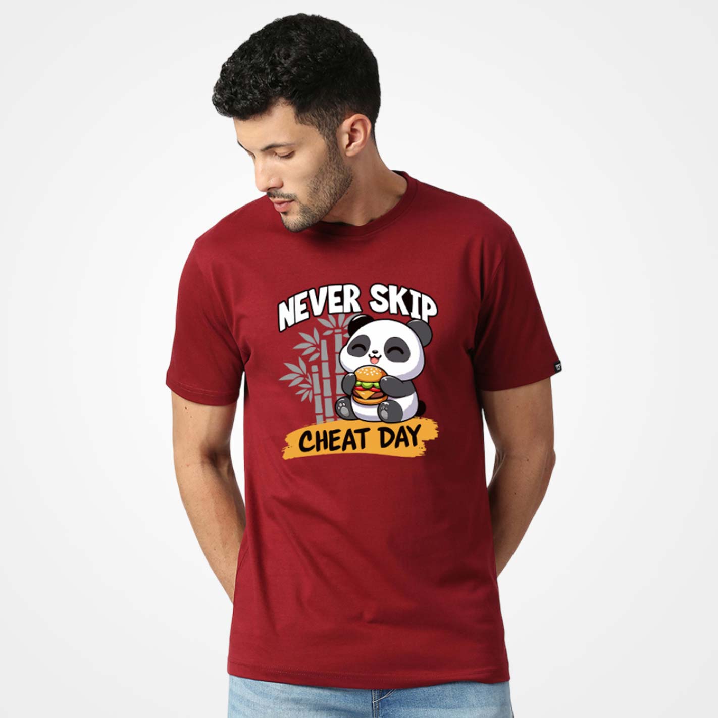 Man wearing a WYO maroon t-shirt with a panda graphic and text on a white background