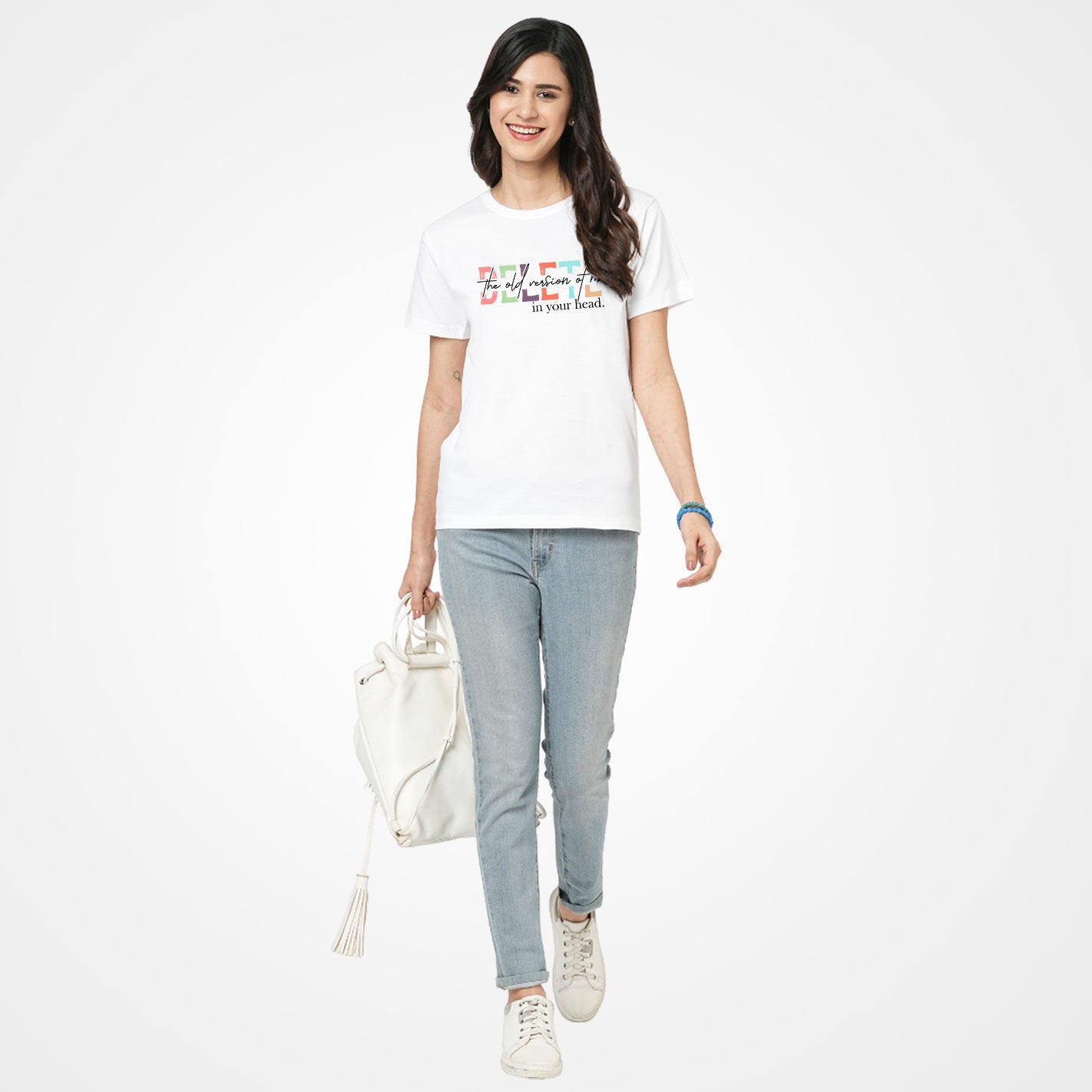 Woman wearing a White t-shirt by WYO with colorful text design on a white background