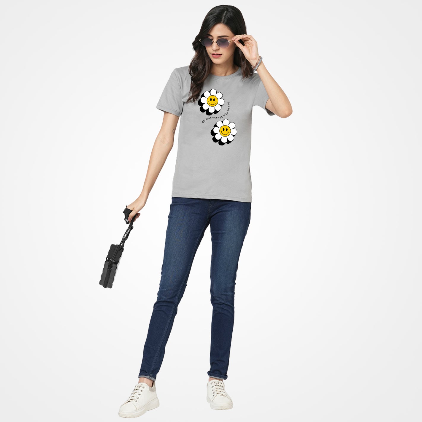 Two smiling daisy flowers with a gray background and text 'Do what makes you happy' by WYO