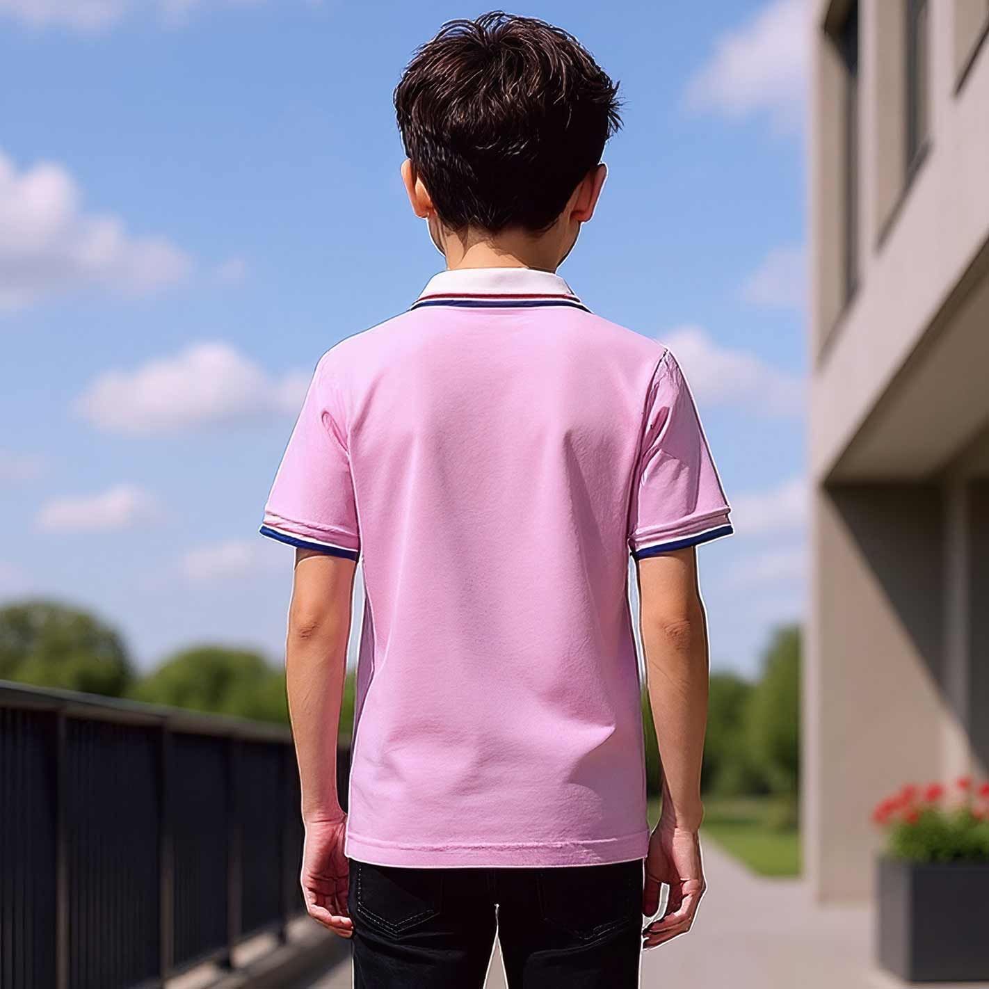 Back view of a Kid wearing a WYO pink polo shirt standing outdoors with a clear blue sky.