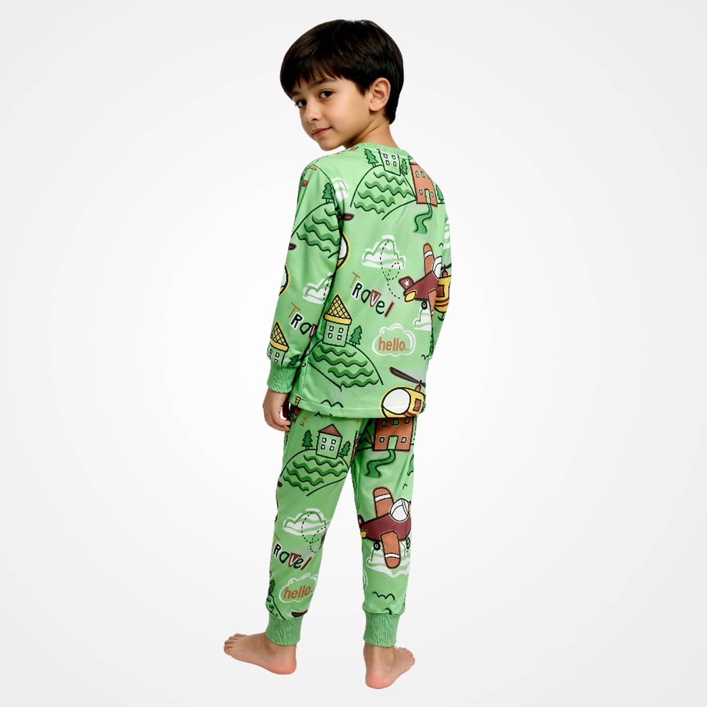 Back view of a Kid wearing a WYO green pajama set with cartoon designs on a white background