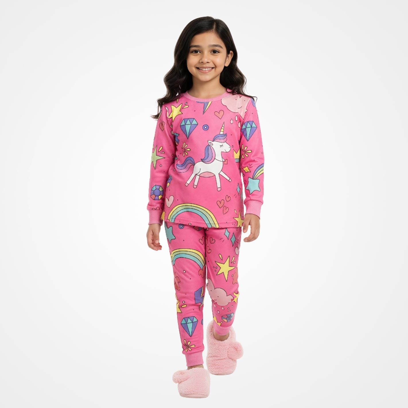 Kid wearing a WYO pink pajamas with colorful designs on a white background