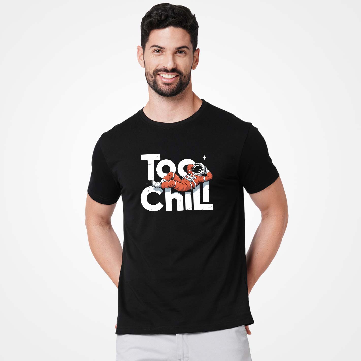 Man wearing a WYO black t-shirt with 'Too Chill' graphic design on a white background