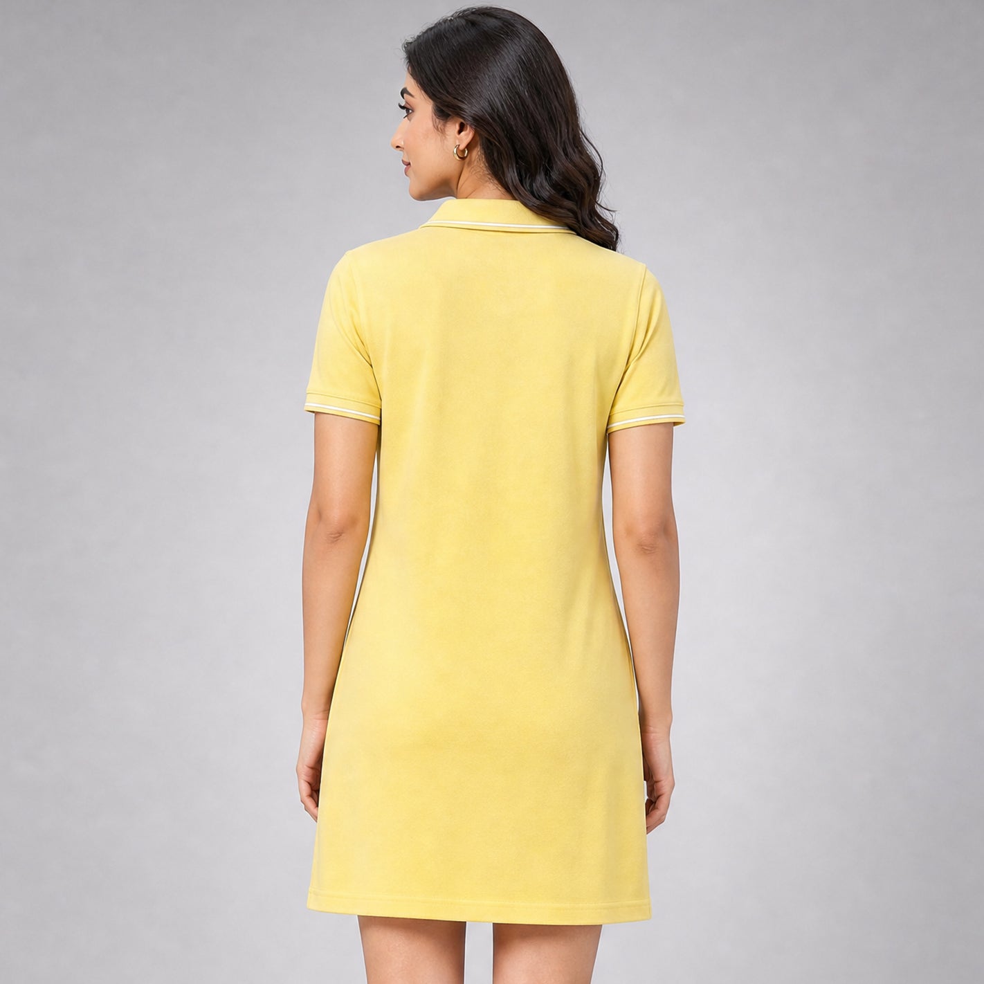 WYO Banana Yellow polo dress back view showing tipped collar and A-line silhouette