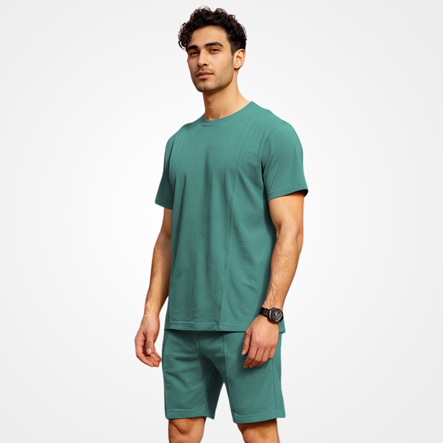 Man wearing a WYO mint t-shirt and shorts set on a white background