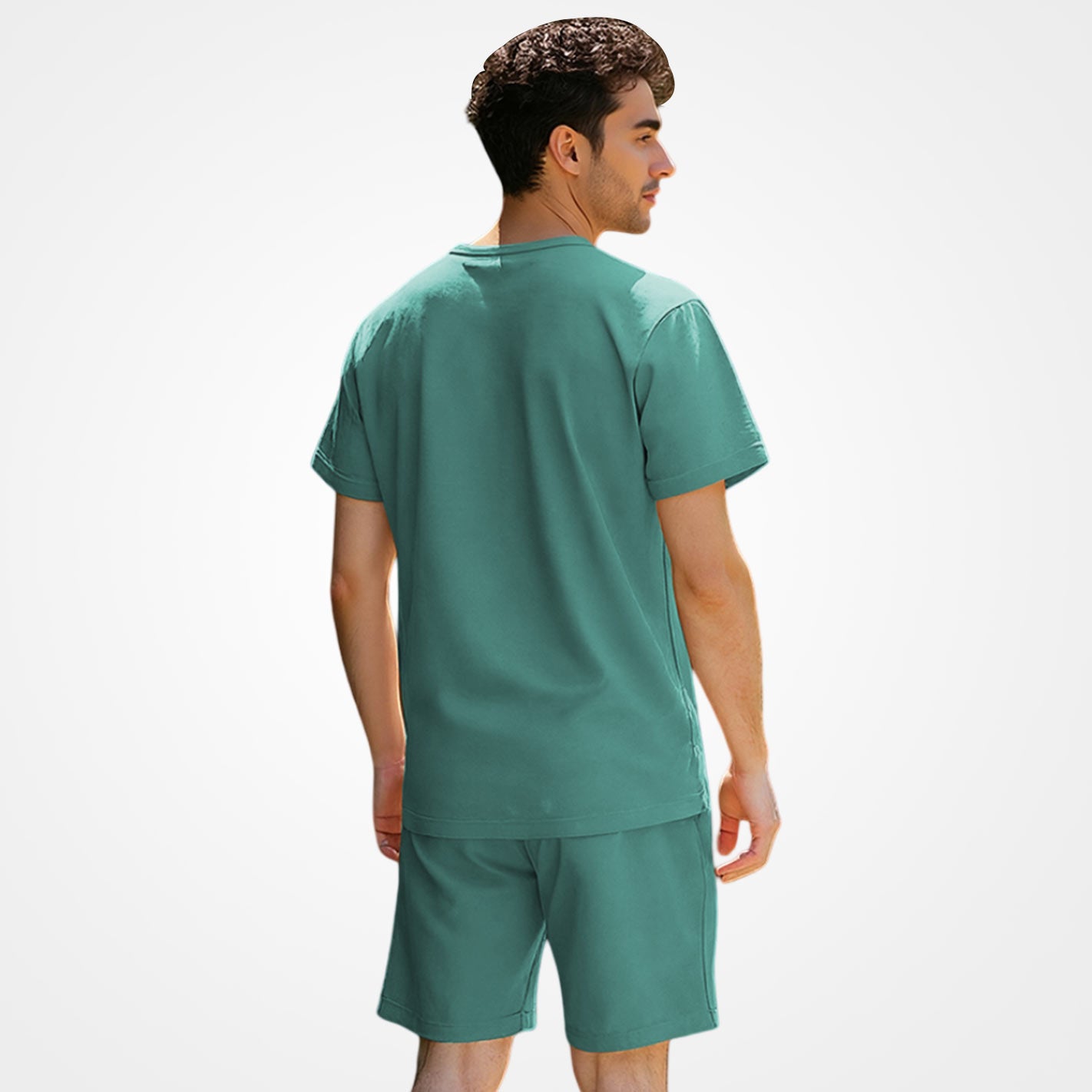 Back View of Man wearing a WYO mint t-shirt and shorts set on a white background