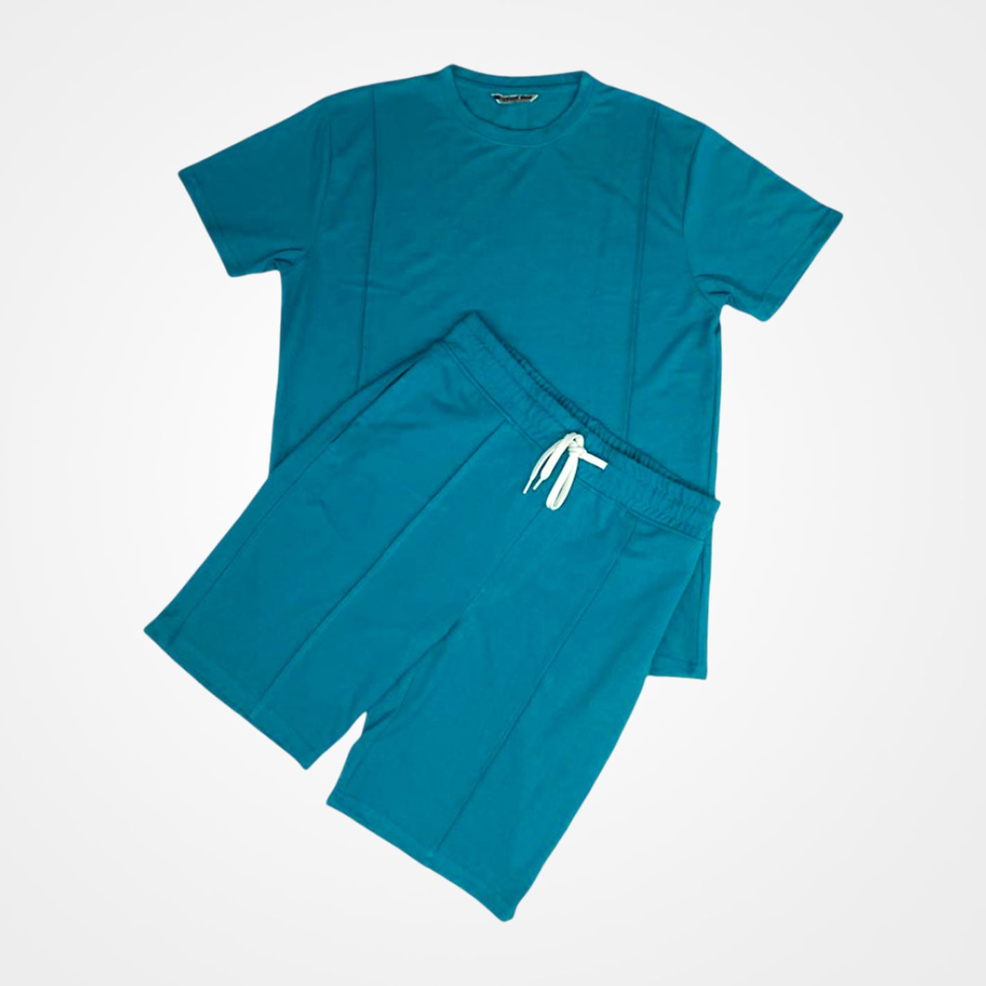 Close View of a Man wearing a WYO teal t-shirt and shorts set on a white background