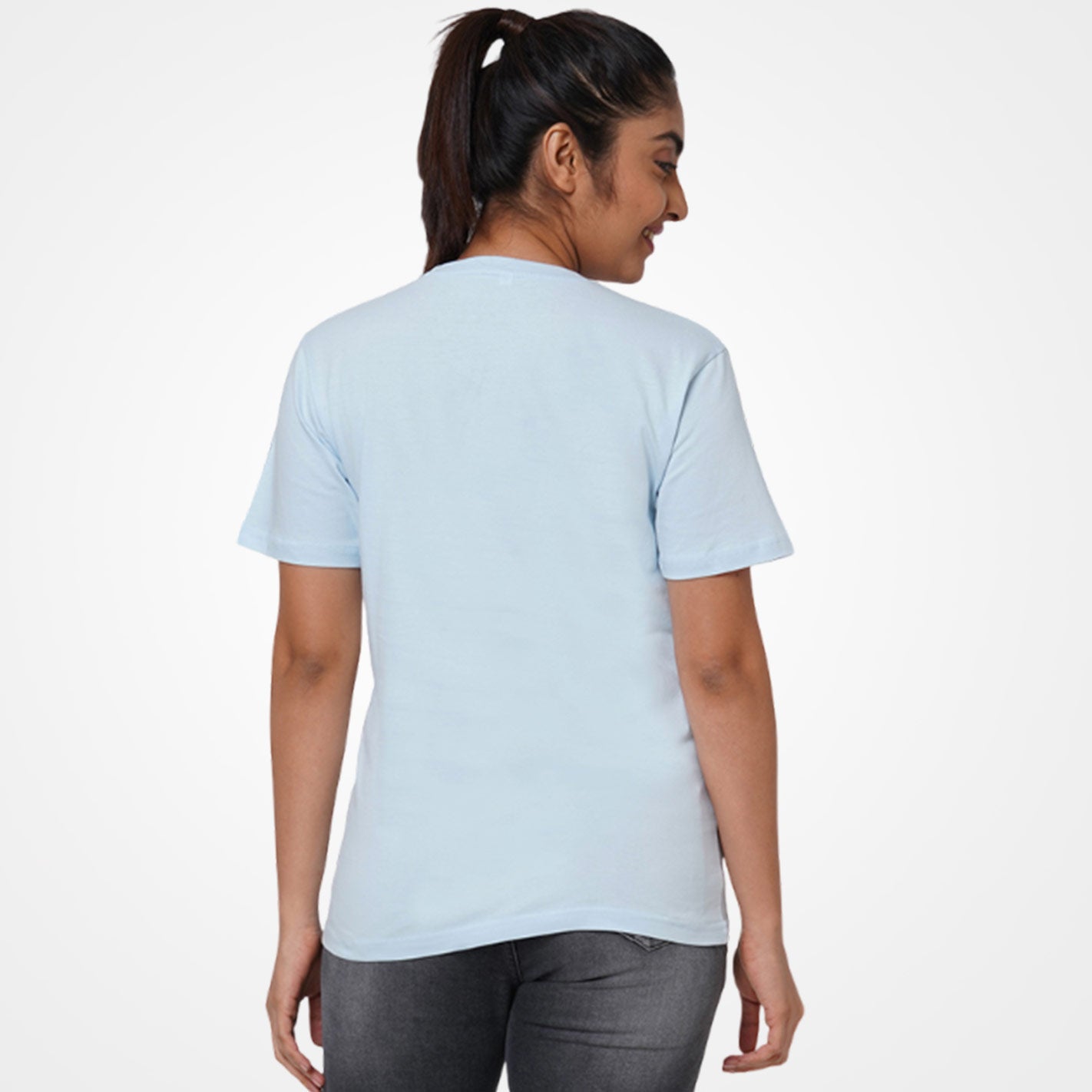 Back View Of a Ice blue t-shirt by WYO with floral design and text on a white background