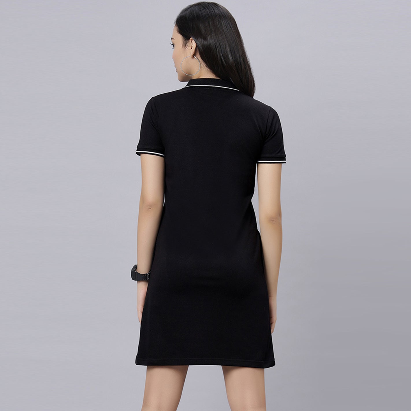 WYO black polo dress back view showing tipped collar and A-line silhouette