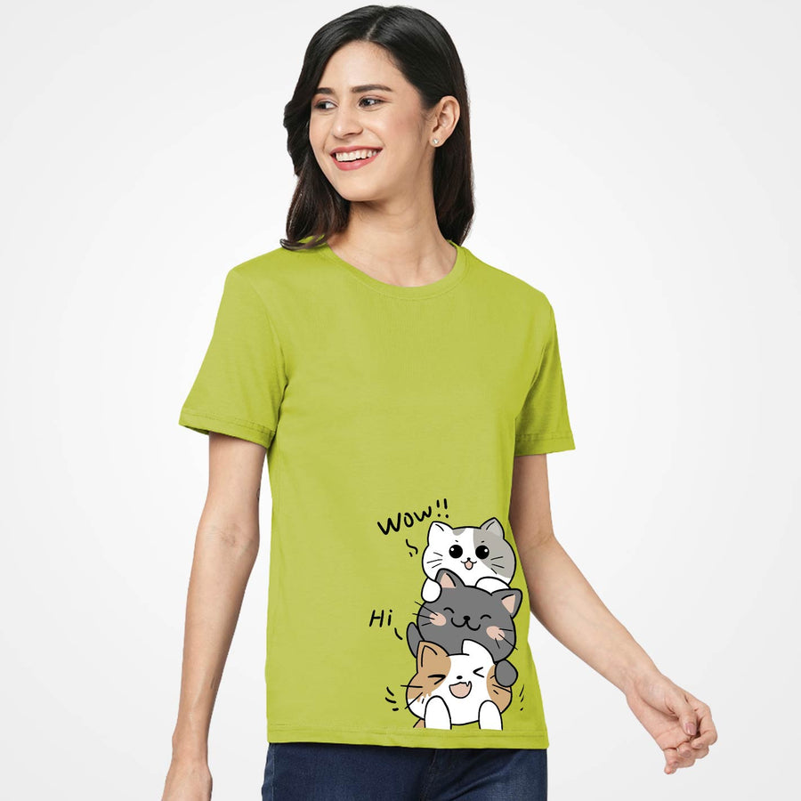 Woman wearing a WYO LimePunch t-shirt with cartoon cat designs on a white background