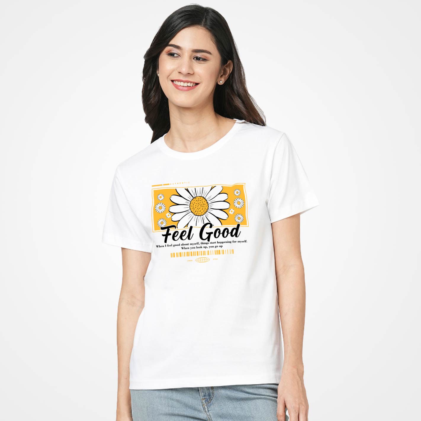 Woman wearing a White t-shirt by WYO with a yellow daisy graphic and 'Feel Good' text on a white background