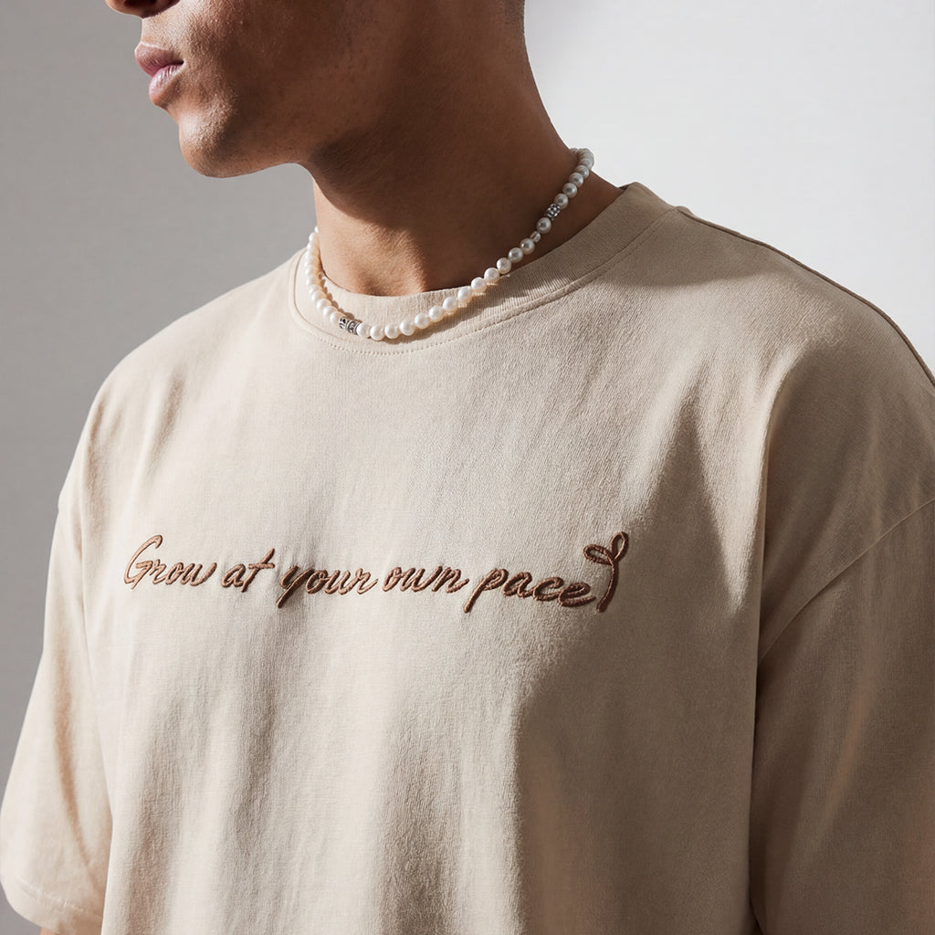 Close-up of WYO Good Things Take Time Oversized T-Shirt