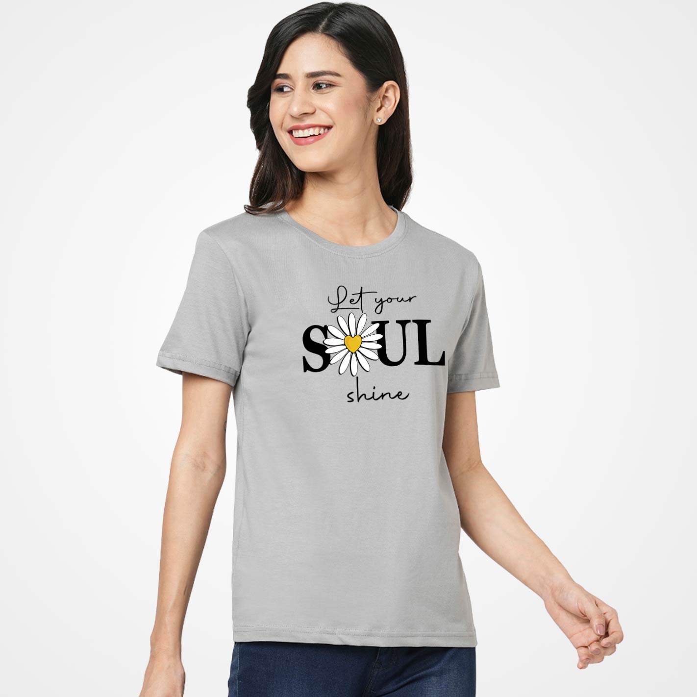 Woman wearing a Gray t-shirt by WYO with a daisy and text design on a white background