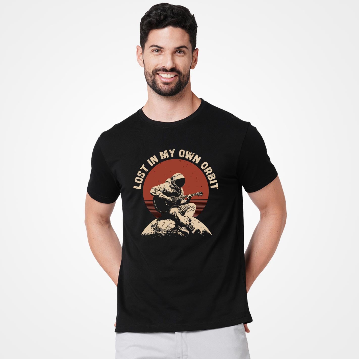 Man wearing a WYO black t-shirt with a graphic design and text on a white background