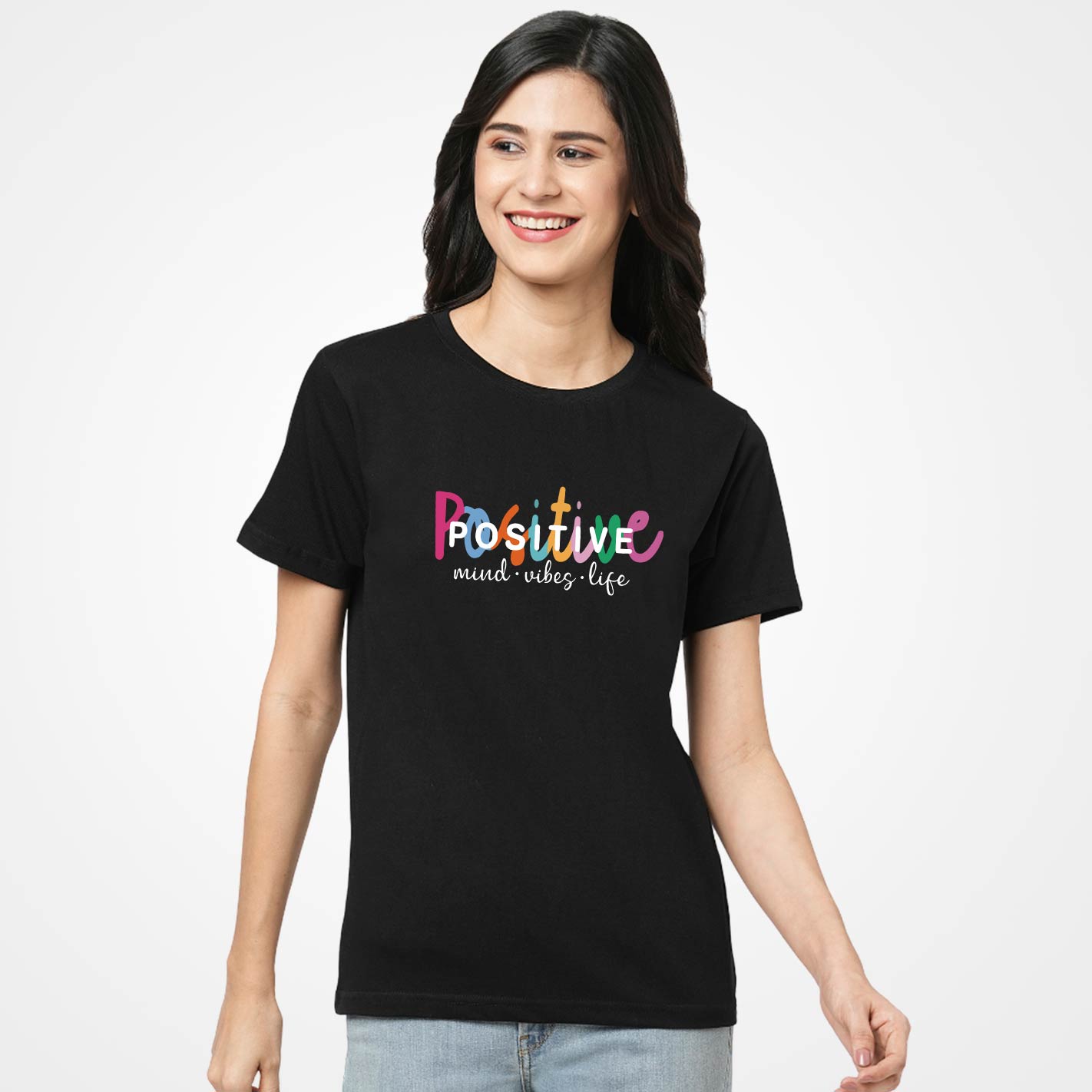 Woman wearing a WYO Colorful text 'Positive mind vibes life' on a black background