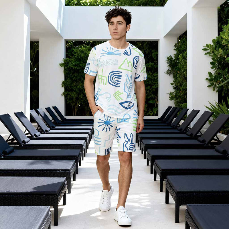 Man wearing a WYO Peace Lifestyle Co-Ord Set standing in front of lounge chairs.