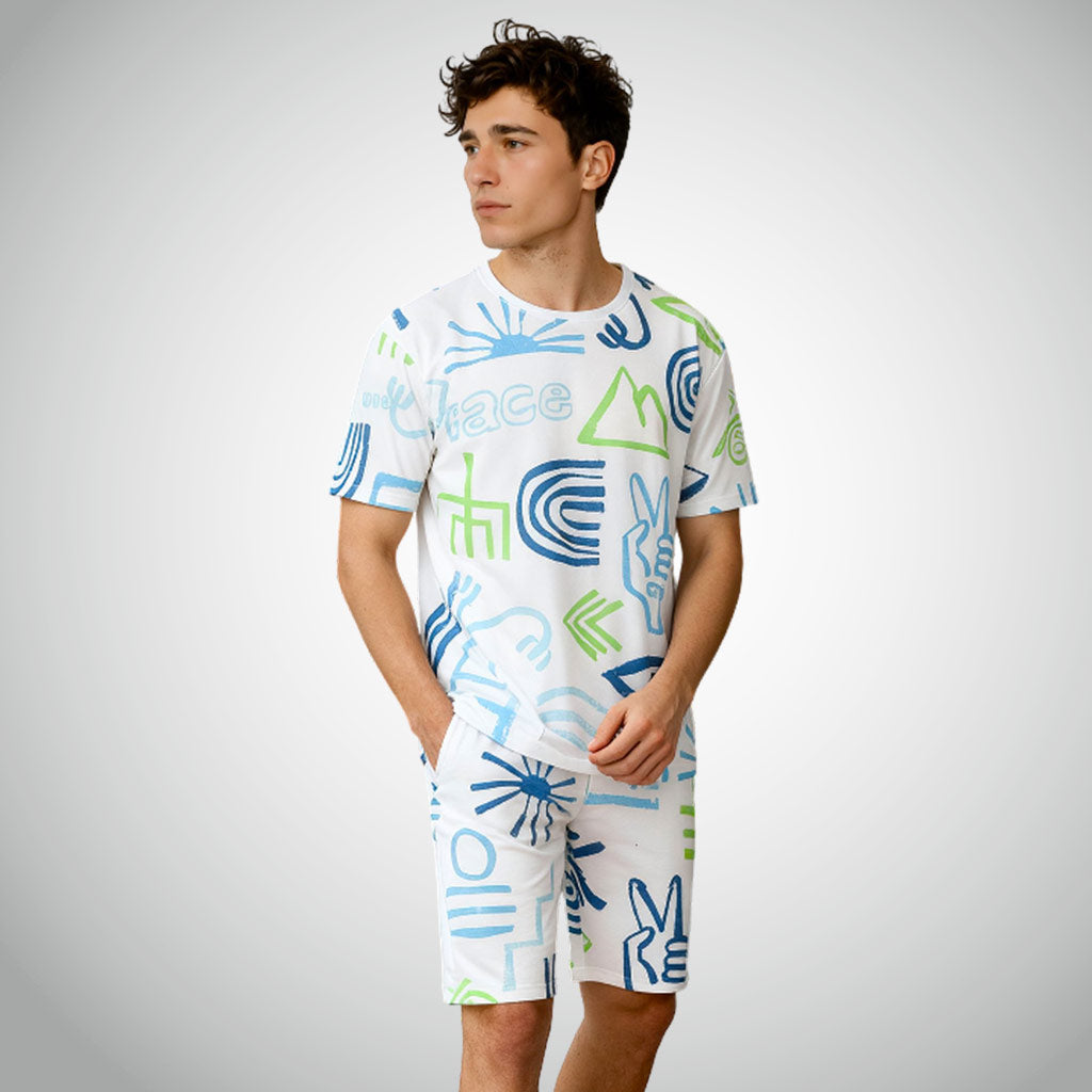Man wearing a WYO Peace Lifestyle Co-Ord Set with colorful geometric patterns on a gray background