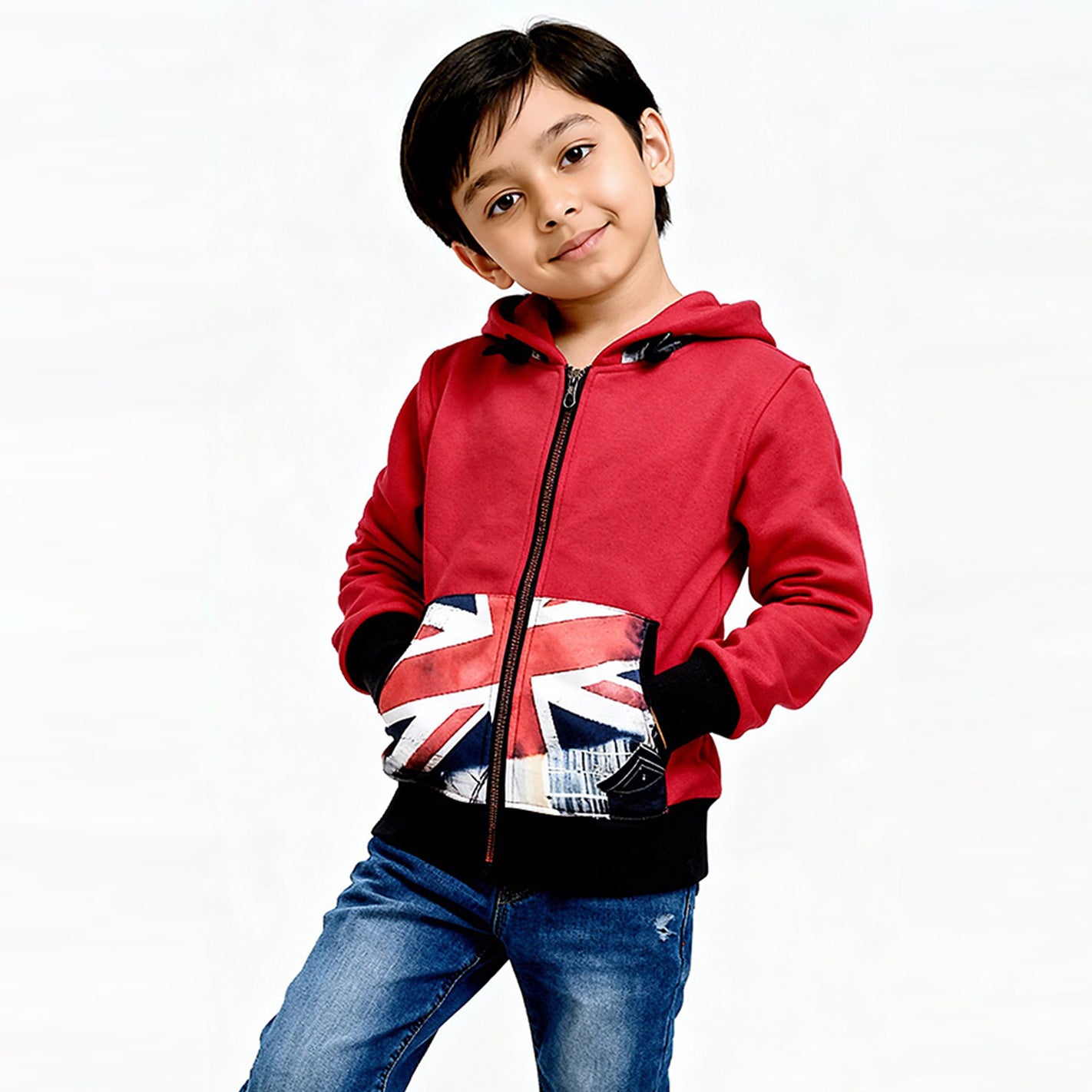 Child wearing a WYO red hoodie with a Union Jack design on a white background