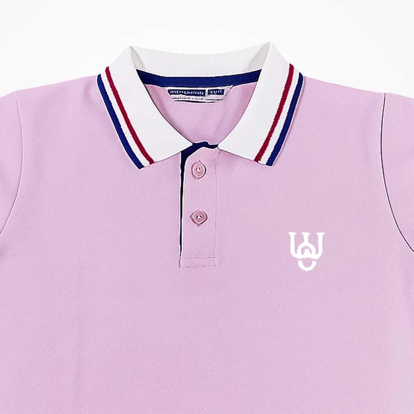 Close up of a WYO Pink polo shirt with a logo on a white background