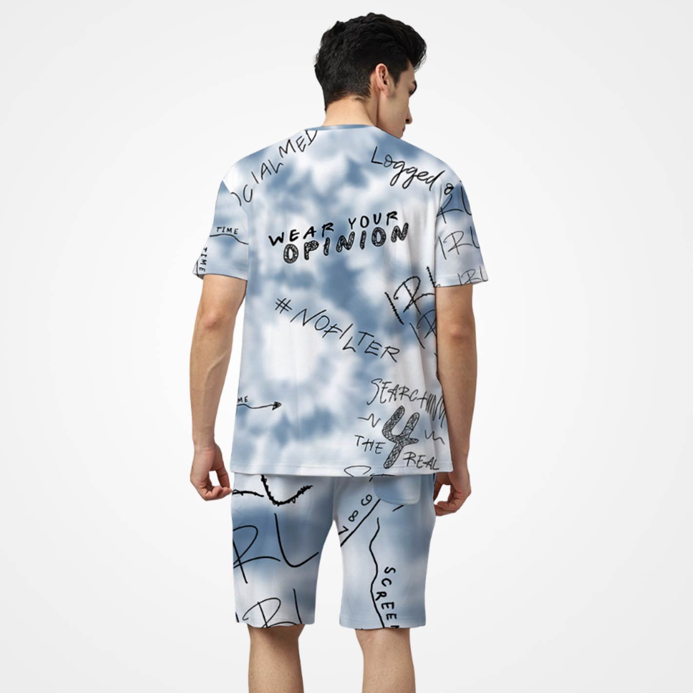 Back View Of a model wearing a WYO tie-dye T-shirt and shorts with text on a white background