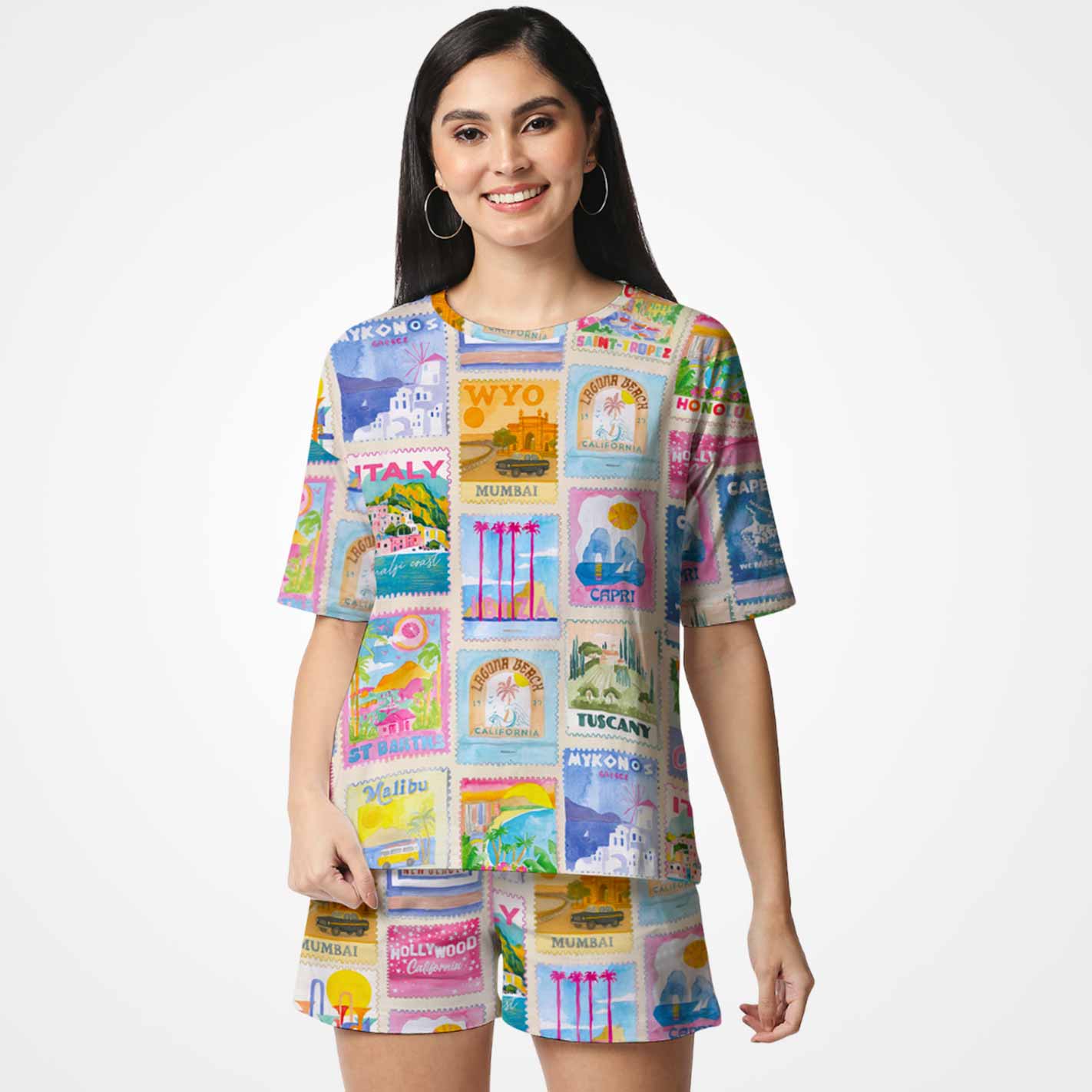 Woman wearing a WYO colorful dress with various designs and text on a white background