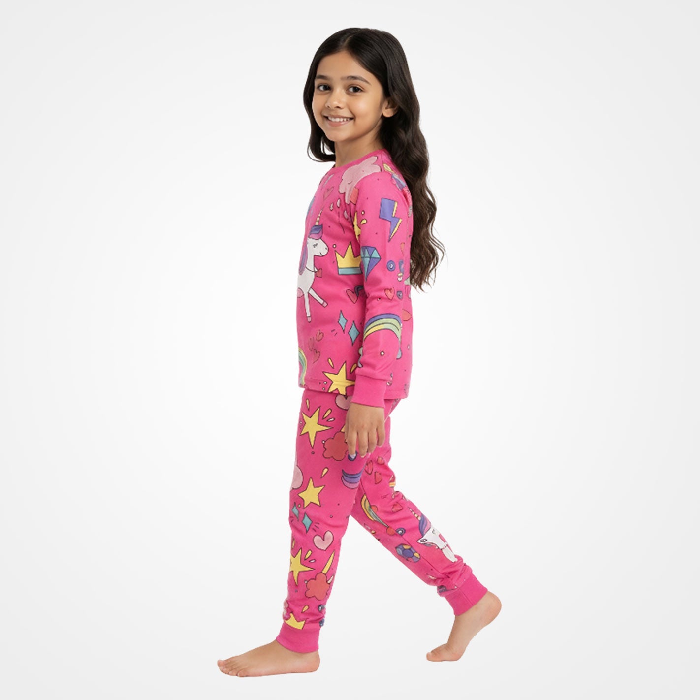 Kid wearing a WYO pink pajamas with colorful designs on a white background